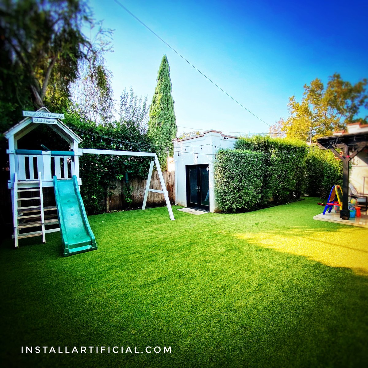 artificial grass playground in the backyard