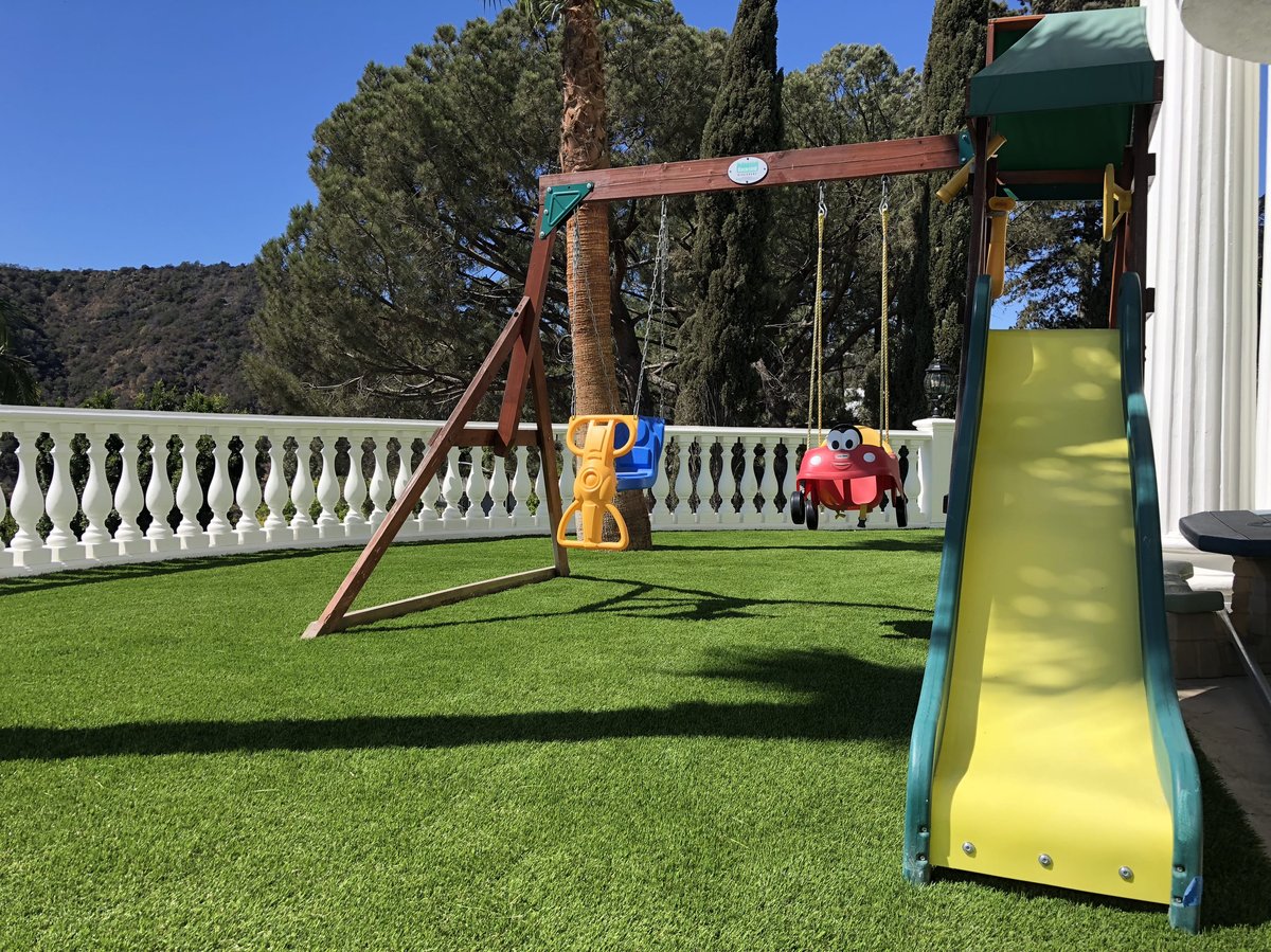 residential swing set artificial turf